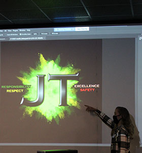 Student presenting graphic design project