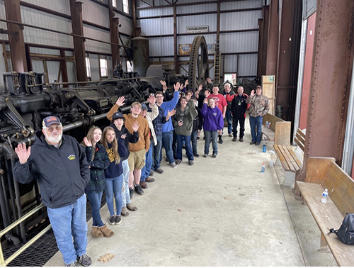 Students with The Snow engine measuring