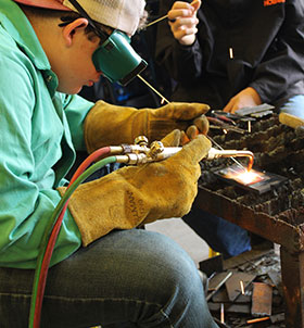 Welding student working