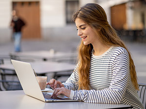 Student working on laptop computer